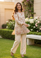 Cream Ethnic Motifs Embroidered Regular Thread Work Silk Crepe Kurti with Trousers